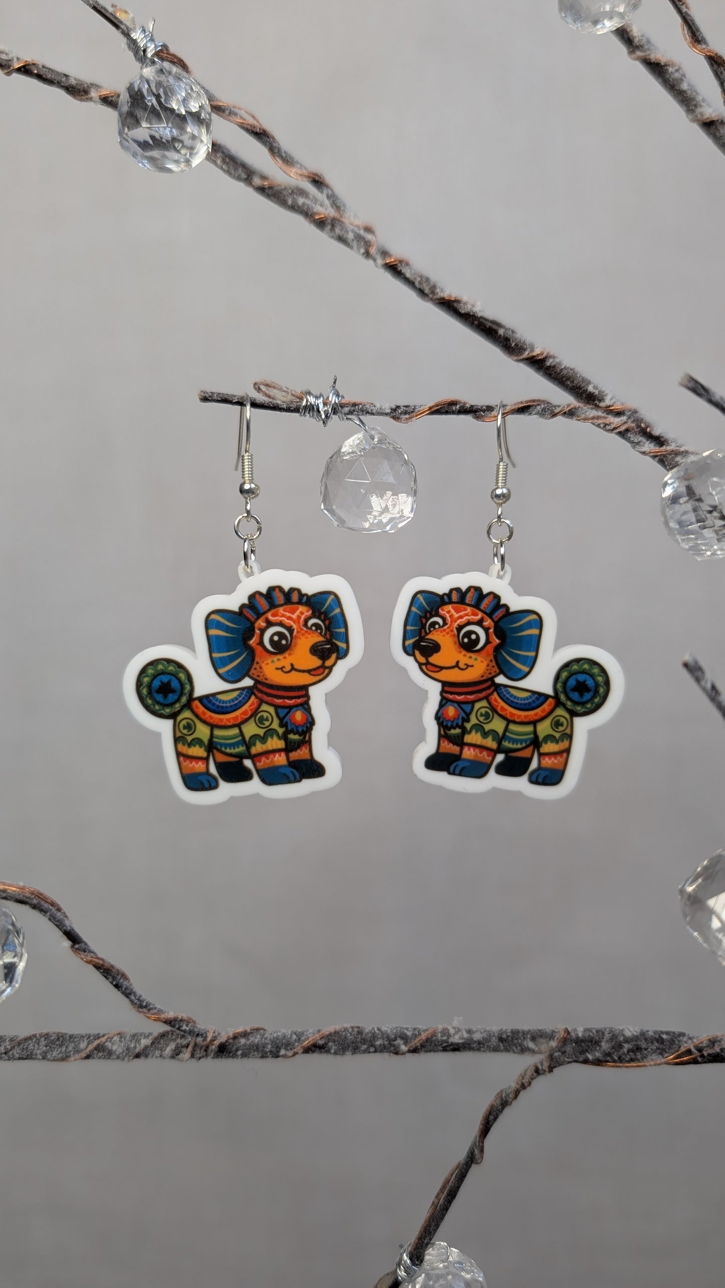 Pair of colorful dog-shaped earrings