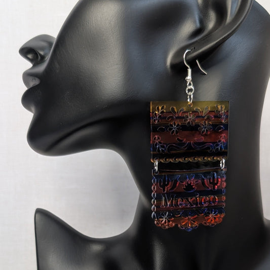 Colorful Serape Earrings Mexico dangle earring with floral, cactus, and Mexico details displayed on a black jewelry stand.