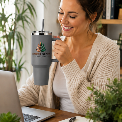Personalized Copper Grove Creations insulated tumbler used at a home office desk, perfect for workdays, remote work, and everyday hydration.
