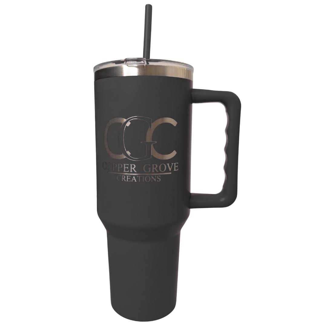 Gray Copper Grove Creations laser engraved insulated tumbler with handle and straw featuring a custom engraved logo design on a clean white background.
