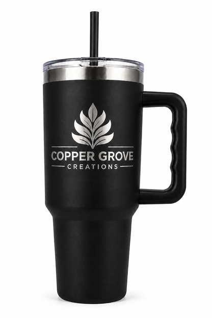 Gray Copper Grove Creations laser engraved insulated tumbler with handle and straw featuring a custom engraved logo design on a clean white background.