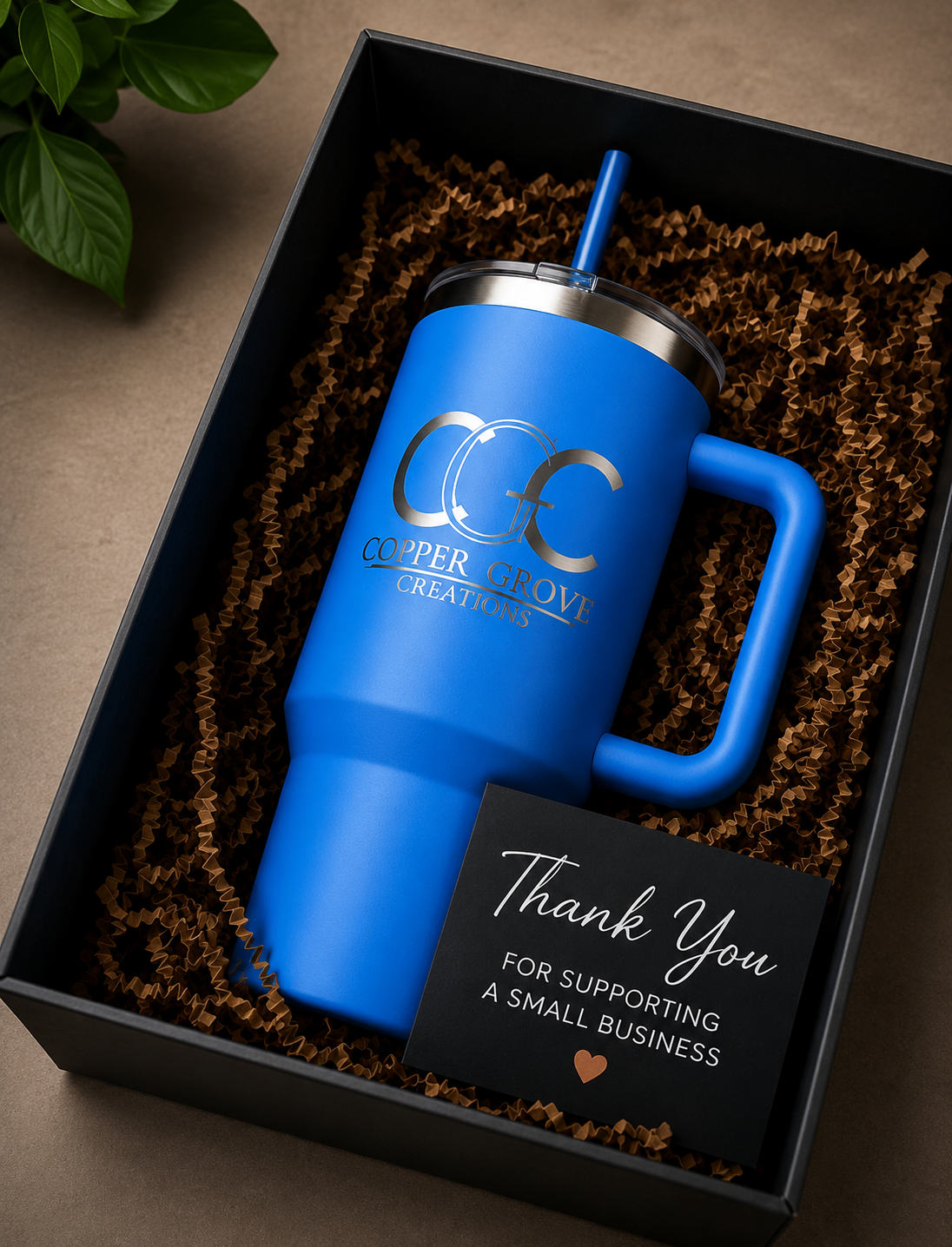 Blue Copper Grove Creations laser engraved insulated tumbler presented in premium gift packaging with a thank-you card, making the perfect personalized gift for special occasions.