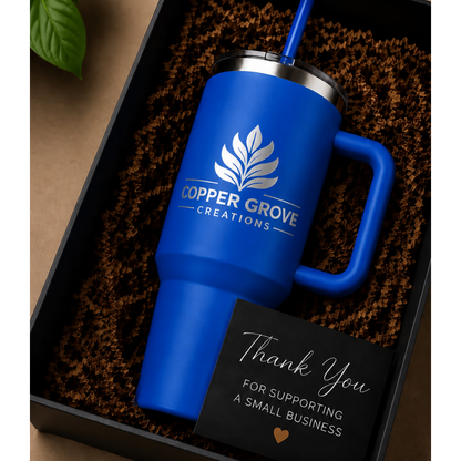 Blue Copper Grove Creations laser engraved insulated tumbler presented in premium gift packaging with a thank-you card, making the perfect personalized gift for special occasions.