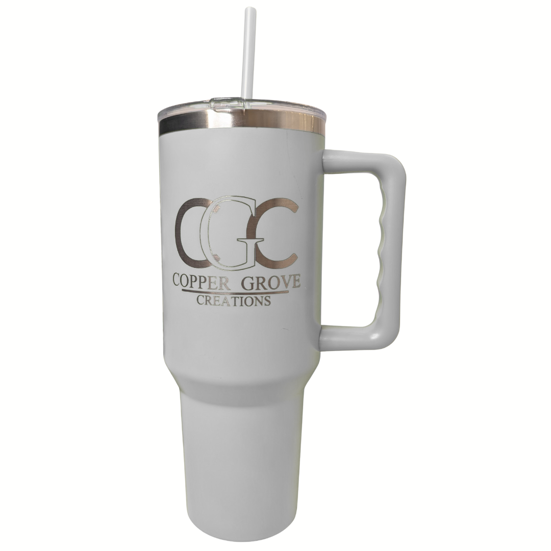White Copper Grove Creations laser engraved insulated tumbler with handle and straw featuring a custom engraved logo design on a clean white background.