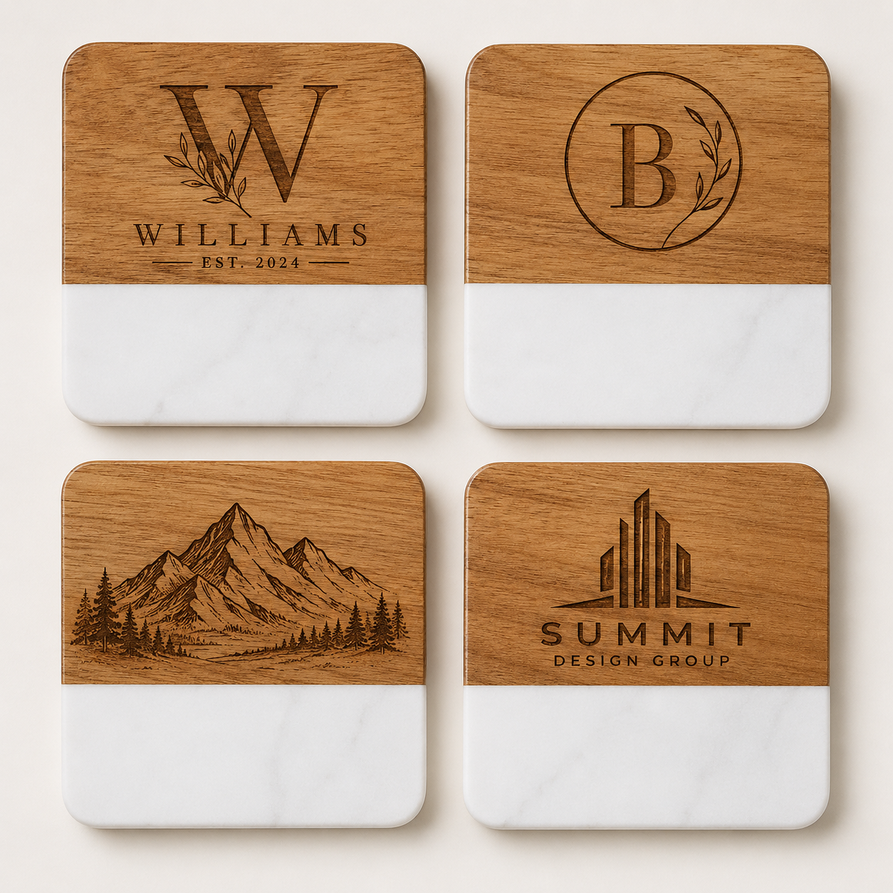 Set of four custom engraved square marble and acacia wood coasters featuring a family name, botanical monogram, mountain design, and business logo.
