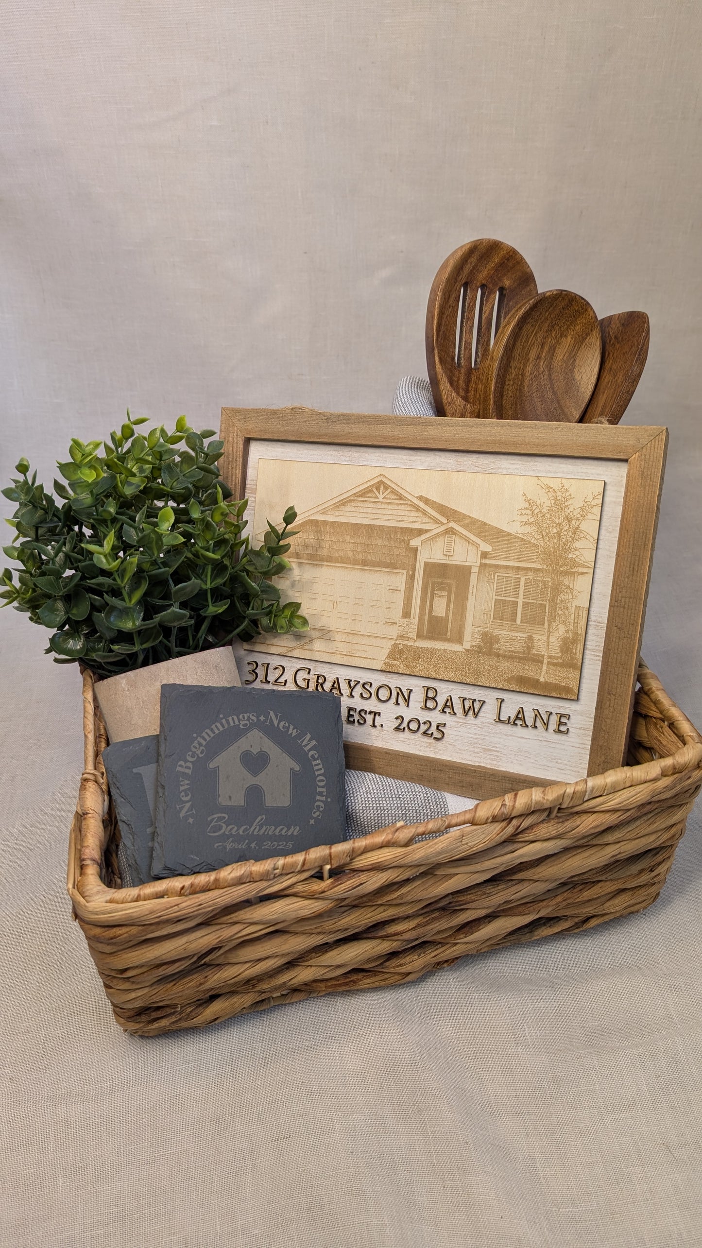 Housewarming gift basket featuring a personalized engraved photo of their new home and custom slate coasters, perfect for realtor closing gifts, new homeowners, and housewarming celebrations.